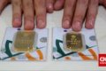harga emas antam - Ilustrasi logam mulia Antam yang mengalami penurunan harga di pasar domestik.