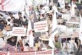 Undang Undang Reforma Agraria - Ilustrasi petani dan pembahasan Undang Undang Reforma Agraria di tingkat legislatif nasional.