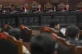 Relawan Gibran 08 - Ilustrasi gedung Mahkamah Konstitusi dan pernyataan sikap kelompok relawan terkait sengketa pemilu.