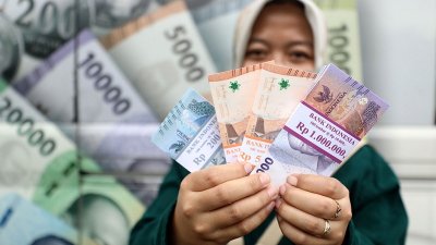 nilai tukar rupiah - Ilustrasi pergerakan nilai tukar rupiah terhadap dolar AS di pasar keuangan.