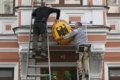 Rusia Tutup Konsulat Jerman - Ilustrasi gedung konsulat dan bendera negara yang menjadi simbol hubungan diplomatik internasional.