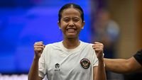 Sumaya raih perak Asian Games 2026 - Ilustrasi atlet kebanggaan Indonesia dan pertandingan sepak bola internasional.