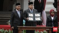 pembangunan digital - Wamenkomdigi Angga Raka Prabowo saat memberikan keterangan terkait pentingnya pemberdayaan masyarakat dalam transformasi digital nasional.