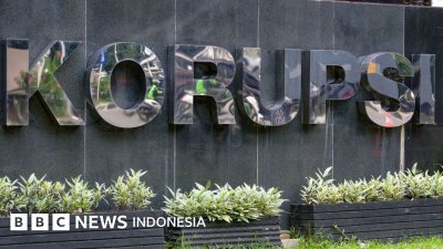 definisi korupsi - Ilustrasi gedung perkantoran dan pembahasan kebijakan hukum serta definisi korupsi di tingkat nasional.